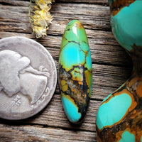 Qingu Spiderweb Turquoise Skinny Oval Cabochon