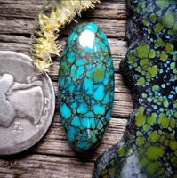 Qingu Spiderweb Turquoise Oval Cabochon