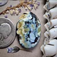 Natural Polychrome White River Oval Cabochon